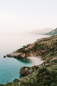 Secluded beach in zingaro nature reserve, sicily