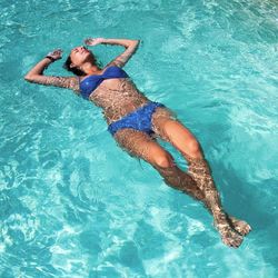 Woman swimming in pool