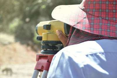 Survey work. the surveyor working in site for check ground level and elevation 