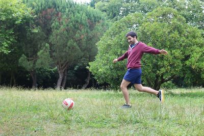 Full length of man running in park