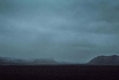 Storm clouds over land