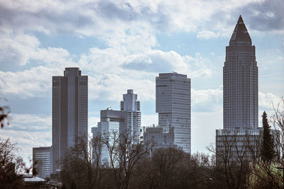 Skyscrapers in city against sky