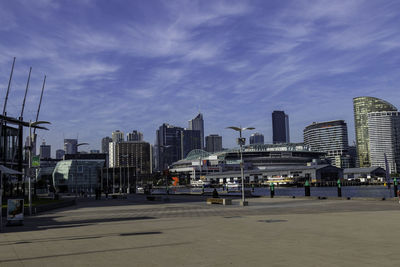 Modern buildings in city against sky