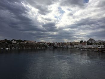 Reflection of sky on water in city