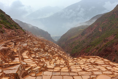 View of mountain range in foggy weather