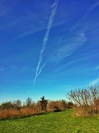 Countryside landscape against blue sky