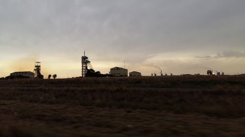 View of landscape against cloudy sky