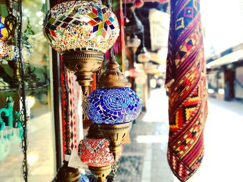 Colorful lanterns hanging outside store