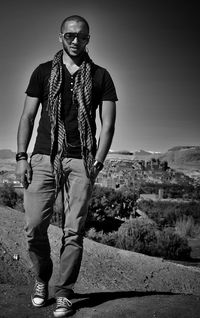 Portrait of man standing on mountain