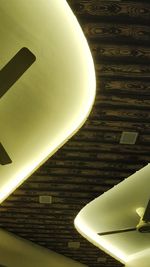 Low angle view of illuminated ceiling