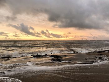 Scenic view of sea against sky during sunset