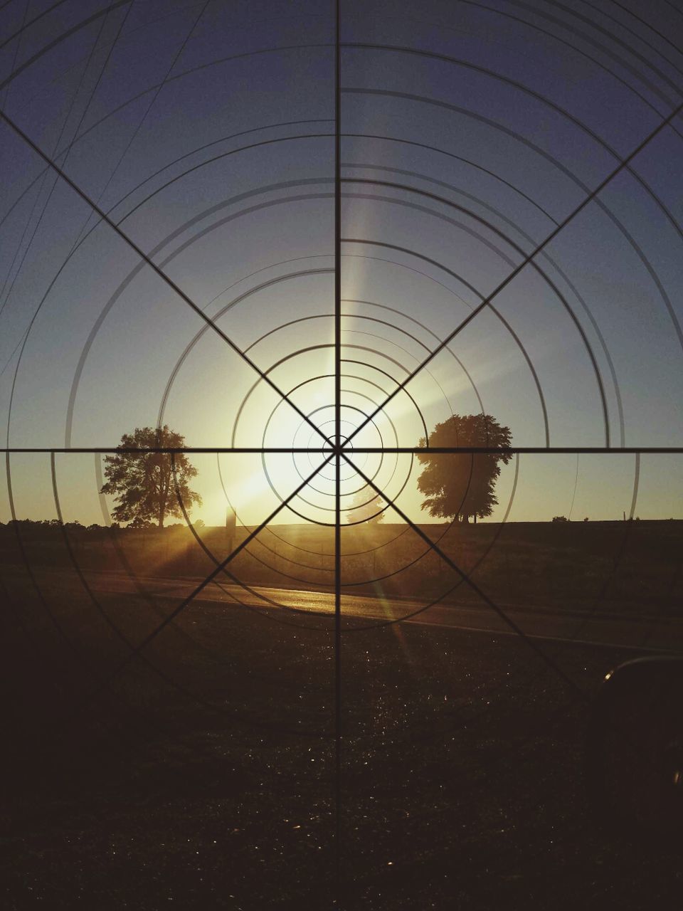 sun, sunset, sky, silhouette, transportation, sunlight, built structure, sunbeam, lens flare, architecture, power line, connection, reflection, glass - material, electricity pylon, no people, indoors, cloud - sky, low angle view