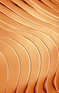Artistic curving lines in classy rose gold color for abstract backdrop