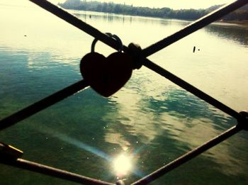 Silhouette of man in lake