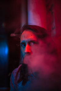 Portrait of man smoking