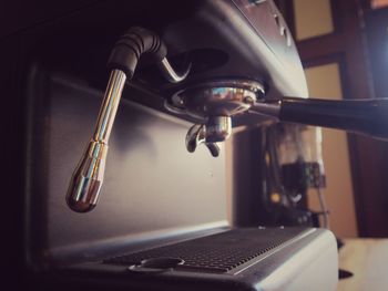 Close-up of faucet in bathroom