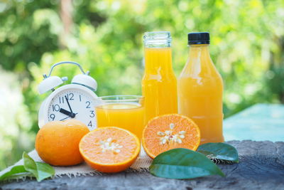 Close-up of orange juice in glass on table