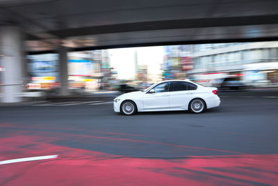 Cars on road in city