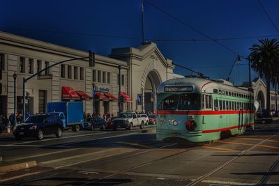 View of cars on city street