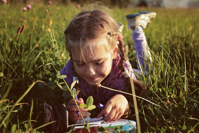 Portrait of young woman using mobile phone