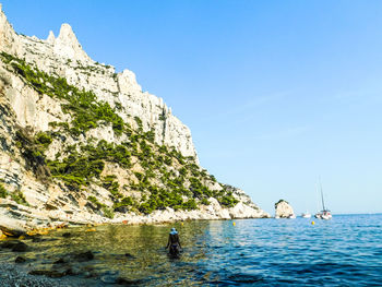 Scenic view of sea against clear sky