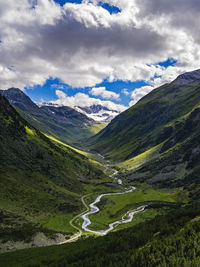 Mountains with sky in background