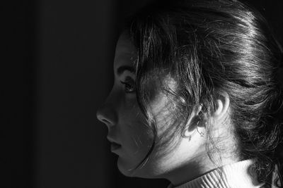 Portrait of woman looking away