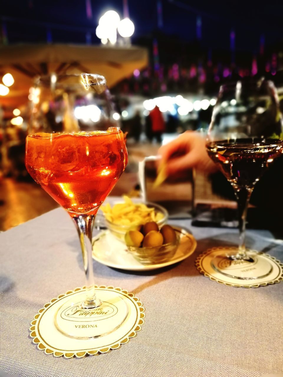 WINEGLASS ON TABLE AT RESTAURANT