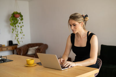 Woman working at home with laptop. home office.  notebook for working. 