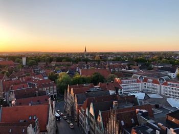 High angle view of city against sky during sunset