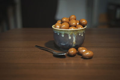 Close-up of fruits in bowl on table