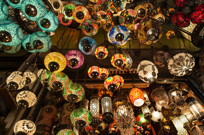 Low angle view of decorations hanging in store