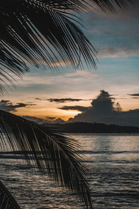 Scenic view of sea against sky at sunset