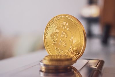 Close-up of coins on table