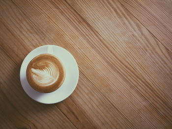 High angle view of cappuccino on table