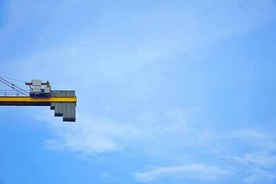 Low angle view of building against blue sky