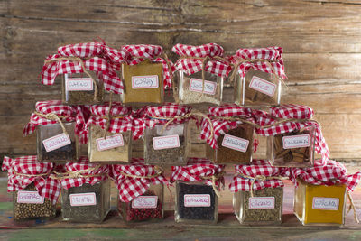 Food arranged in containers on table for sale