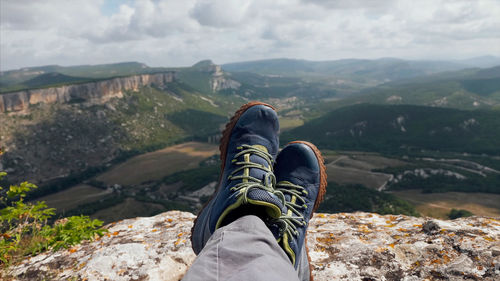 Low section of man on rock