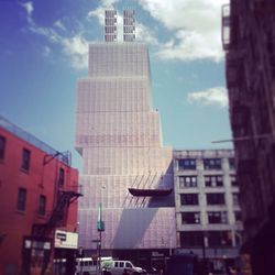 Low angle view of skyscrapers against sky