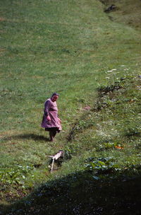 Rear view of boy in water