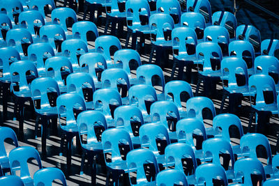 High angle view of empty chairs arranged outdoors