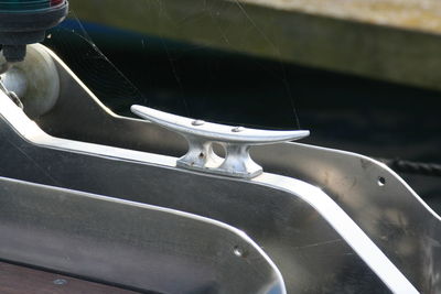 Cropped image of car on railing