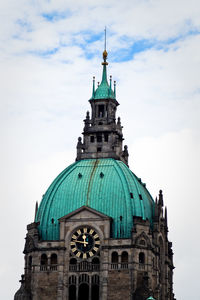 New town hall against cloudy sky