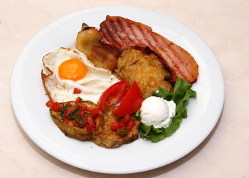 High angle view of breakfast served in plate on table