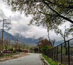 View of road against cloudy sky