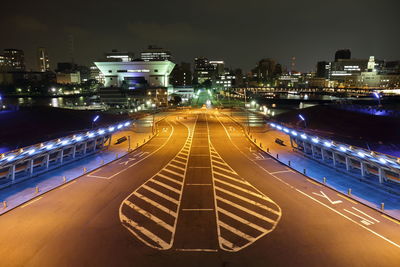 High angle view of illuminated city at night