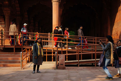 People in front of historical building