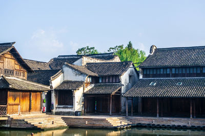 Houses and buildings against sky