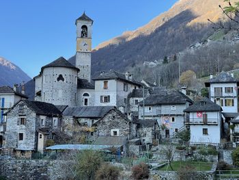 Buildings in city against sky in lavertezzo