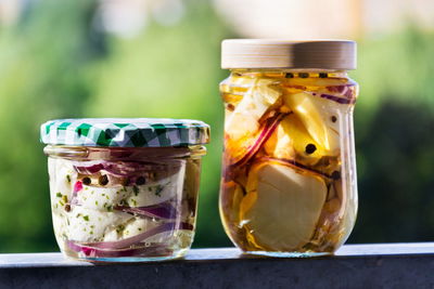 Close-up of drink in glass jar on table